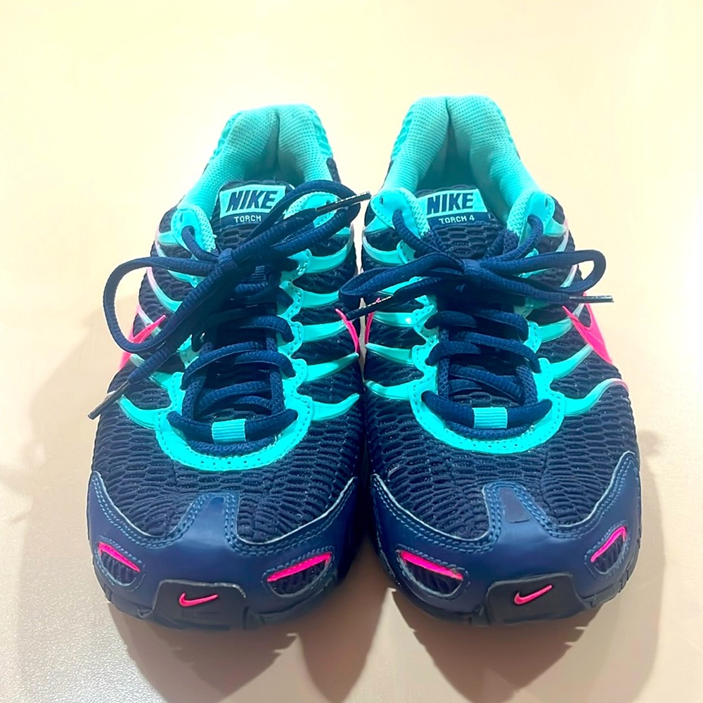 Women’s size 8, dark blue, teal and pink Nikes